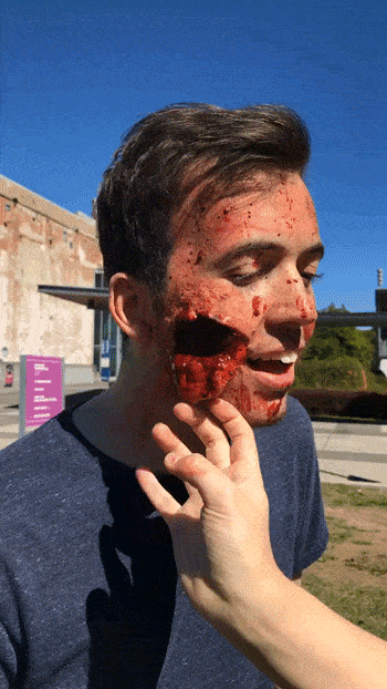Flesh Male zombie make up with flap of flesh