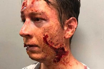 Male zombie makeup behind the scenes of containment