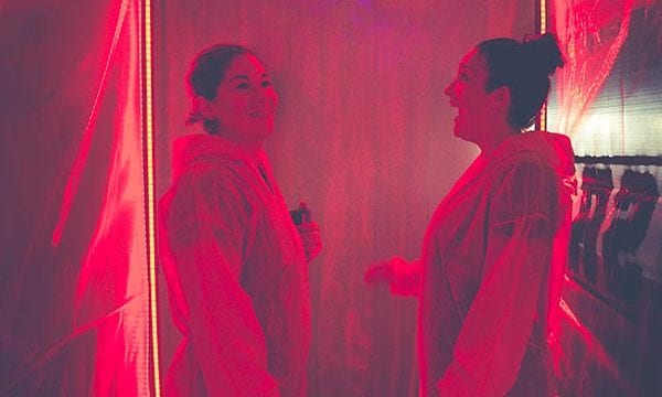 Containment tent 2 players in disinfection tent with red lighting