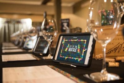 Out of the Bottle wine tablet Close up of tablet with Out of the Bottle game at wine tasting event