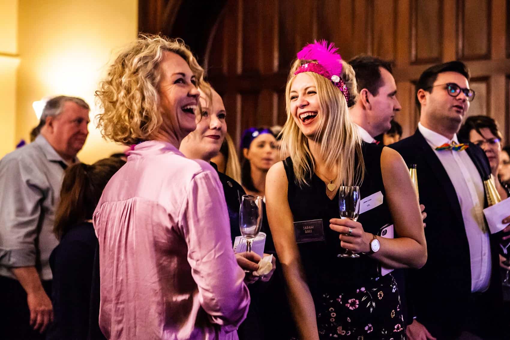 Group of women laughing at Christmas Party event