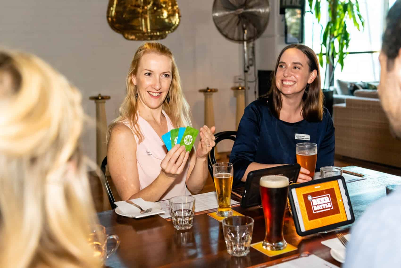 Guests laughing during beer tasting event