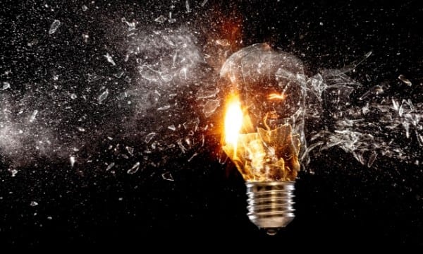 Close up of light bulb shattering