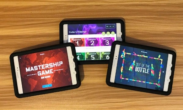 3 tablets with the Directors of the Extraordinary app loaded