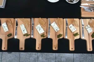 Cheese boards lined up for tasting event