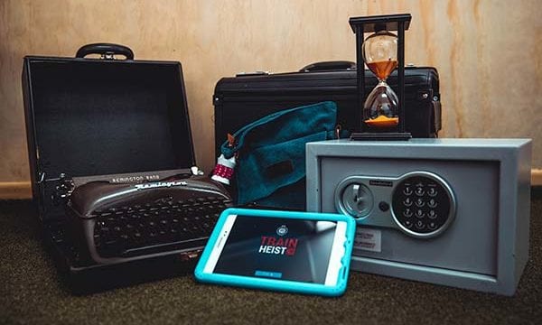 Licensing train heist Kit of Train Heist experience including typewriter and safe