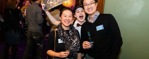 2 guests and an actor posing for the camera during networking