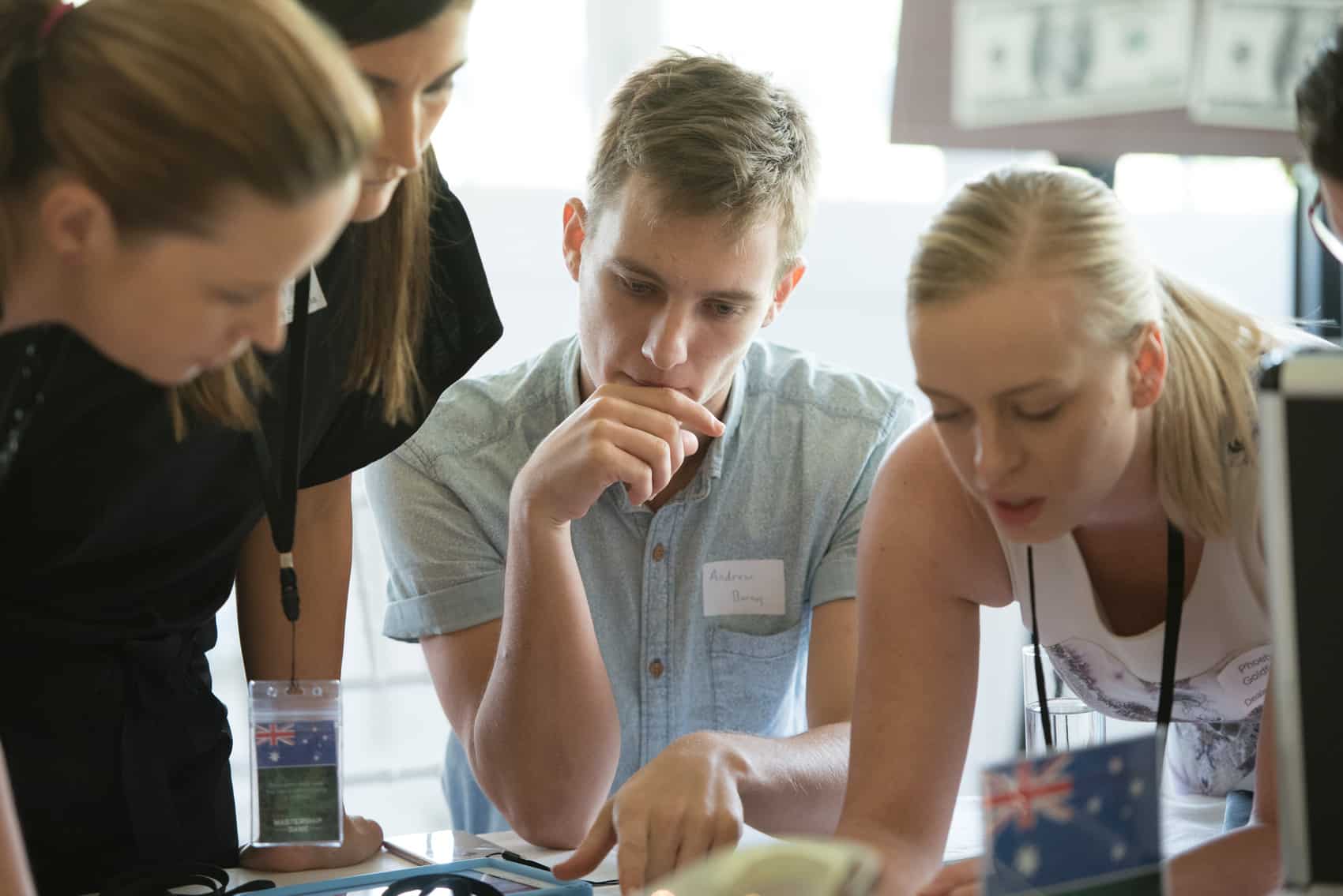 Guest thinking hard solving a puzzle in team building activity