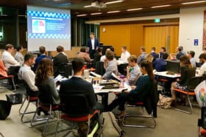 MBA students sitting in a team building workshop