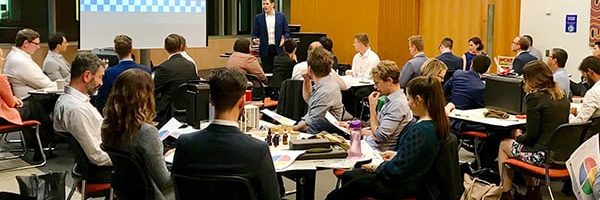UQ MBA students sitting in a team building workshop