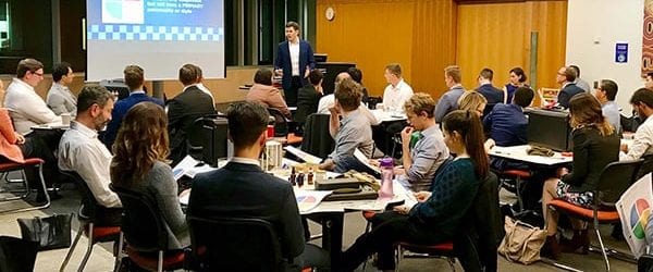 UQ MBA students sitting in a team building workshop